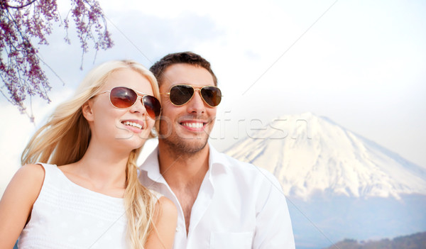 happy couple over fuji mountain in japan Stock photo © dolgachov