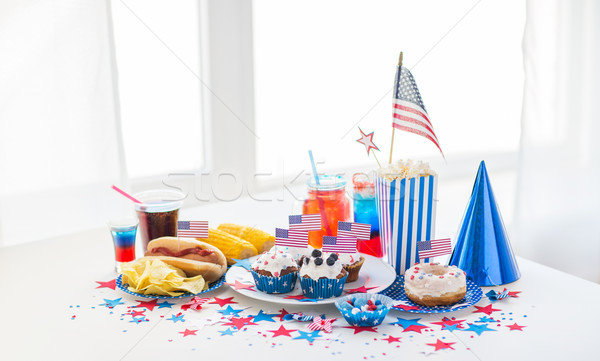 food and drinks on american independence day party Stock photo © dolgachov