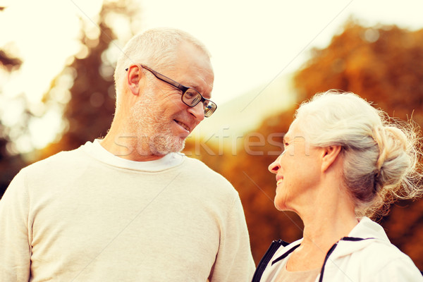 senior couple in city park Stock photo © dolgachov