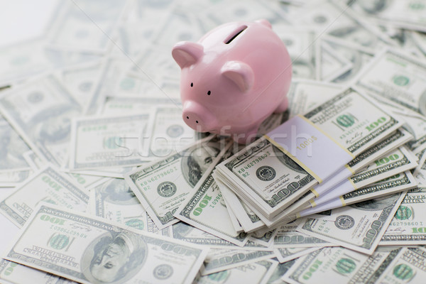 close up of american dollar money and piggy bank Stock photo © dolgachov