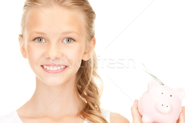 Stockfoto: Tienermeisje · spaarvarken · geld · foto · meisje · gelukkig
