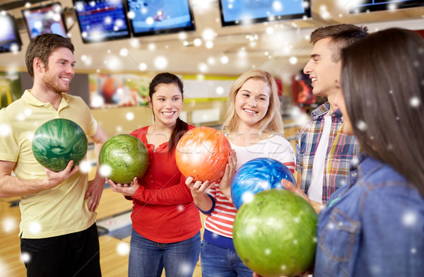 Boldog barátok bowling klub téli idény emberek Stock fotó © dolgachov