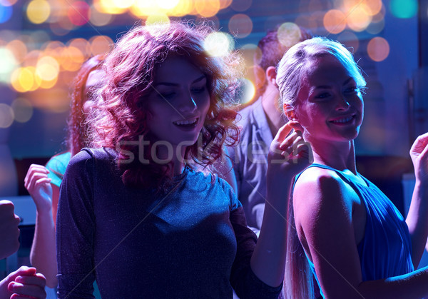 Groep gelukkig vrienden dansen nachtclub partij Stockfoto © dolgachov