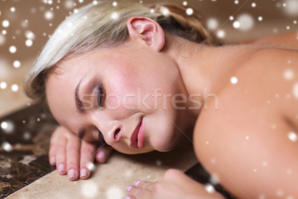 young woman lying on hammam table in turkish bath Stock photo © dolgachov