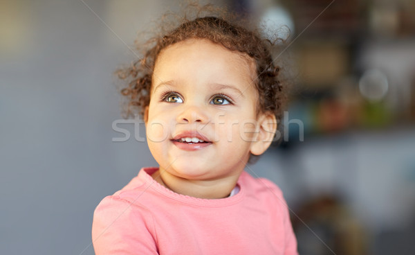 beautiful little mulatto baby girl face Stock photo © dolgachov