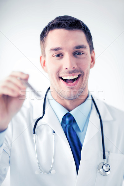 male ear nose throat doctor Stock photo © dolgachov