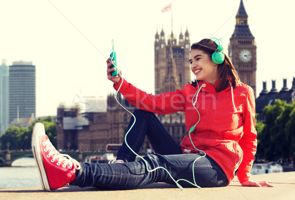 Feliz auriculares tecnología viaje Foto stock © dolgachov