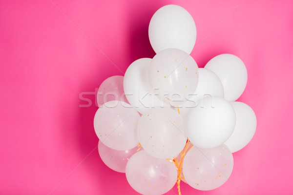 Beyaz helyum balonlar pembe tatil Stok fotoğraf © dolgachov