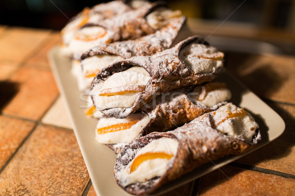 pastry on plate at bakery Stock photo © dolgachov