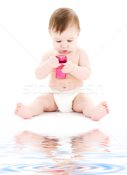 Stock photo: baby with cell phone