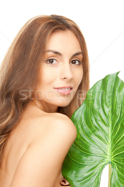 woman with green leaf Stock photo © dolgachov