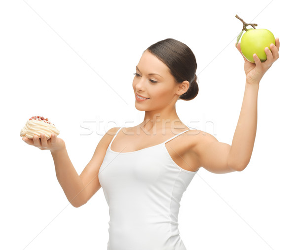 woman with cake and apple Stock photo © dolgachov