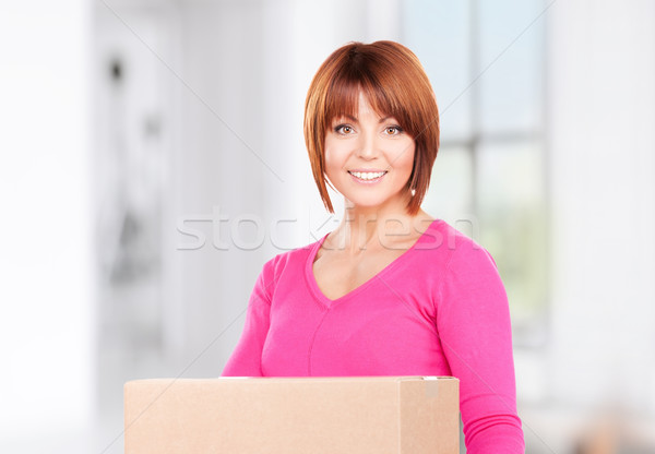 Stock photo: businesswoman with parcel
