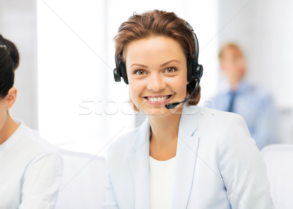 friendly female helpline operator Stock photo © dolgachov