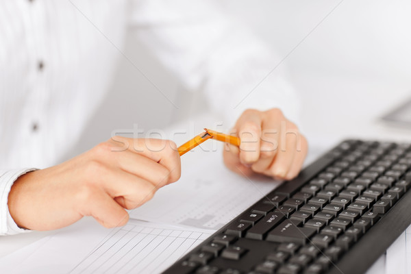 woman breaking pencil Stock photo © dolgachov