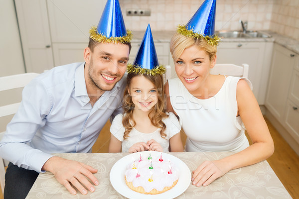 Souriant famille bleu gâteau célébration [[stock_photo]] © dolgachov