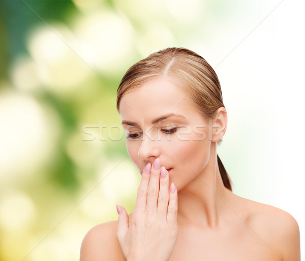 young woman doing hush gesrute Stock photo © dolgachov