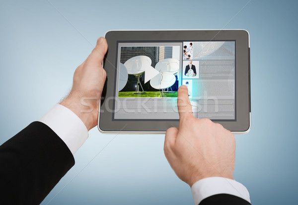 close up of man hands touching tablet pc Stock photo © dolgachov