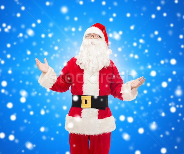 man in costume of santa claus Stock photo © dolgachov