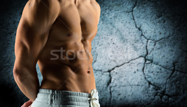 close up of male bodybuilder bare torso Stock photo © dolgachov