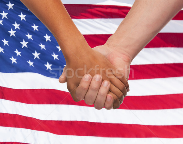 close up of hands holding over american flag Stock photo © dolgachov