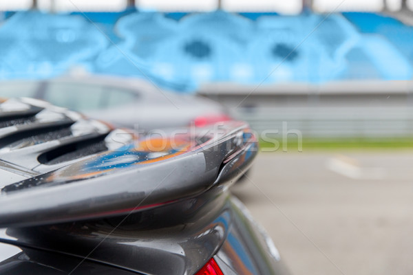close up of car spoiler on speedway at stadium Stock photo © dolgachov