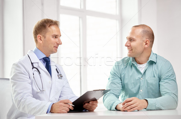 Männlichen Arzt Patienten Zwischenablage Krankenhaus Medizin Gesundheitspflege Stock foto © dolgachov
