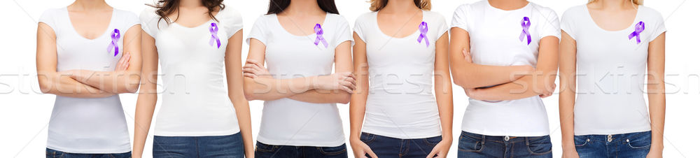close up of women with purple awareness ribbon Stock photo © dolgachov
