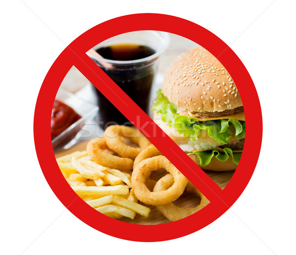 close up of fast food and drink behind no symbol Stock photo © dolgachov
