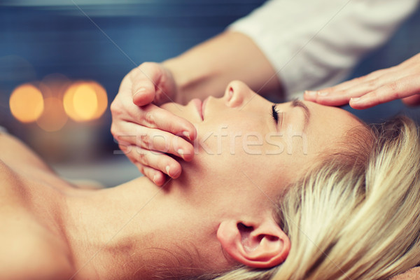 Stock photo: close up of woman having face massage in spa