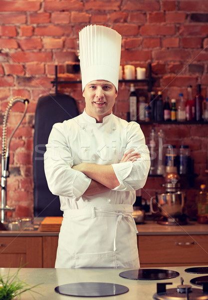 happy male chef cook in restaurant kitchen Stock photo © dolgachov