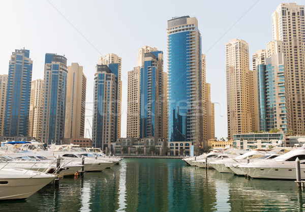 Dubai city seafront or harbor with boats Stock photo © dolgachov