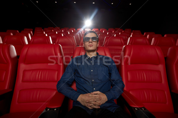 Fiatalember néz film 3D színház mozi Stock fotó © dolgachov