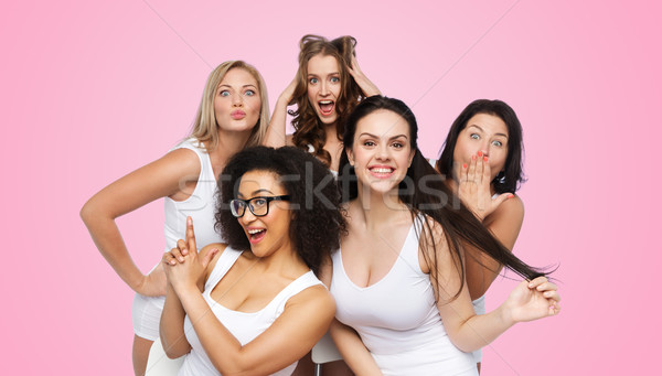 Grupo feliz mulheres branco roupa interior Foto stock © dolgachov