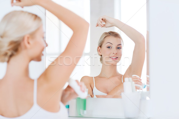 Nő dezodor fürdőszoba szépség higiénia reggel Stock fotó © dolgachov