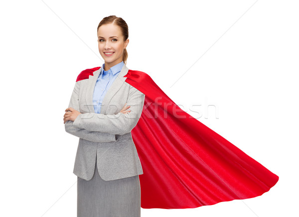 young smiling businesswoman in red superhero cape Stock photo © dolgachov
