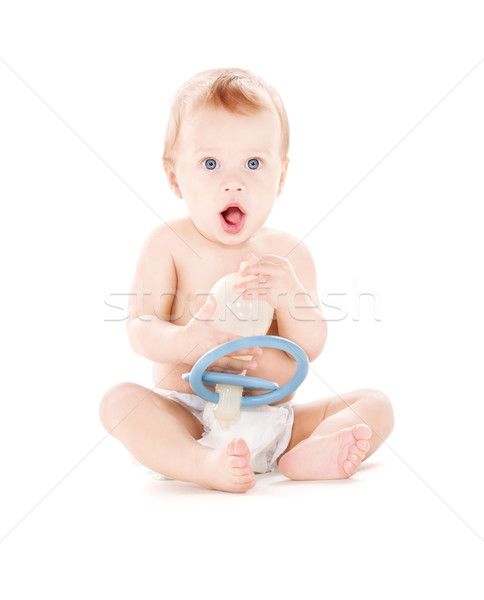 Bebê menino grande chupeta quadro branco Foto stock © dolgachov
