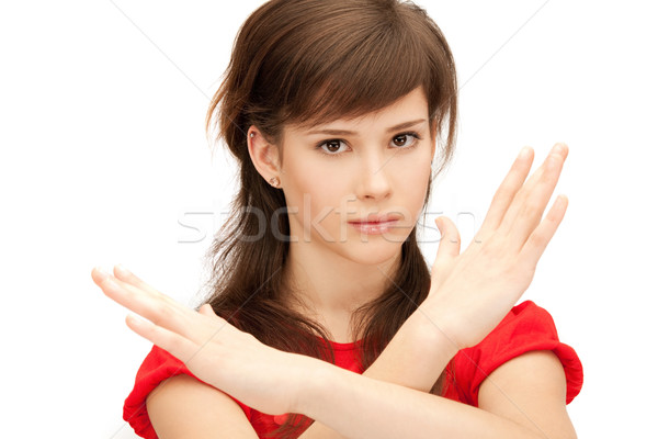 teenage girl making stop gesture Stock photo © dolgachov