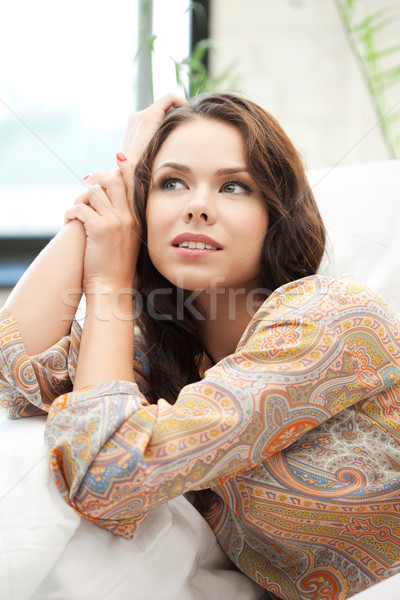 daydreaming woman Stock photo © dolgachov