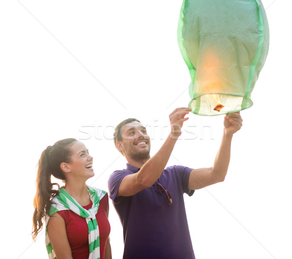 Couple chinois ciel lanternes plage été [[stock_photo]] © dolgachov