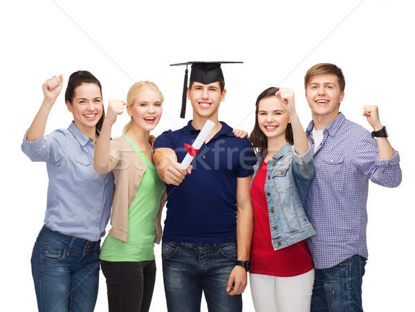 Stockfoto: Groep · permanente · glimlachend · studenten · diploma · onderwijs