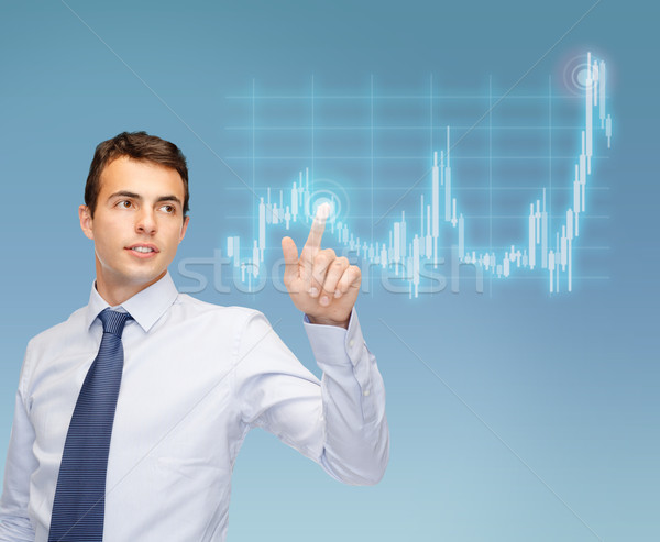 man working with forex chart on virtual screen Stock photo © dolgachov