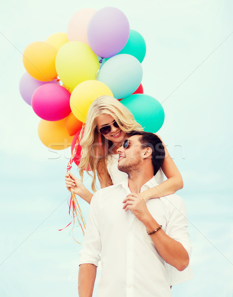 Casal colorido balões beira-mar verão férias Foto stock © dolgachov