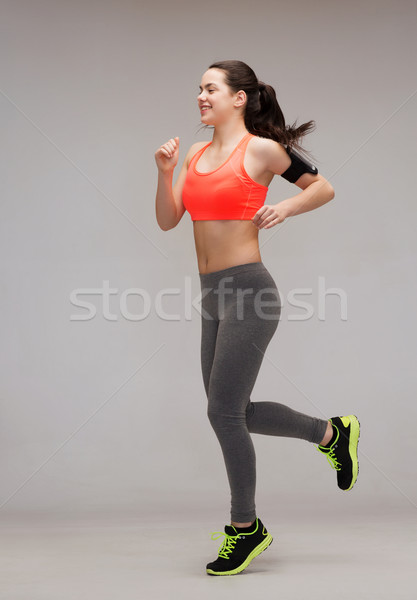 Mulher corrida saltando fitness esportes Foto stock © dolgachov