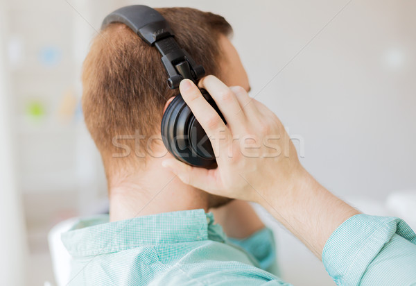 Stockfoto: Man · hoofdtelefoon · home · technologie · muziek