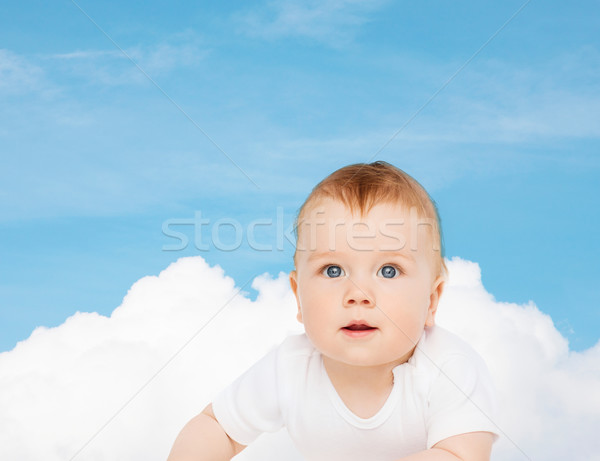 smiling baby looking up Stock photo © dolgachov