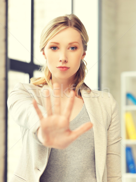 young woman making stop gesture Stock photo © dolgachov