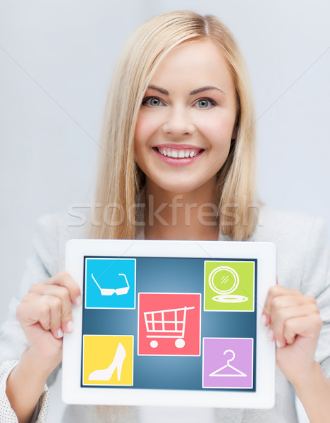 smiling woman showing tablet pc computer screen Stock photo © dolgachov