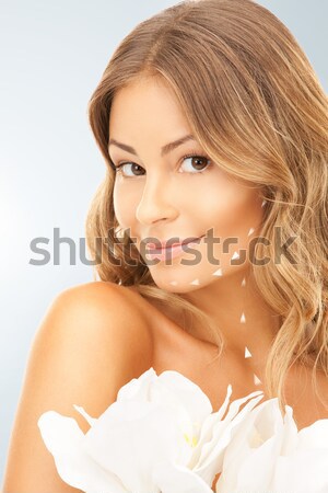 beautiful woman with white flower Stock photo © dolgachov