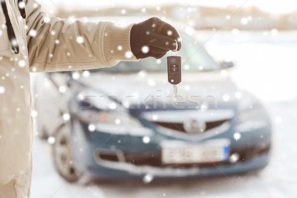 close up of man with car key outdoors Stock photo © dolgachov